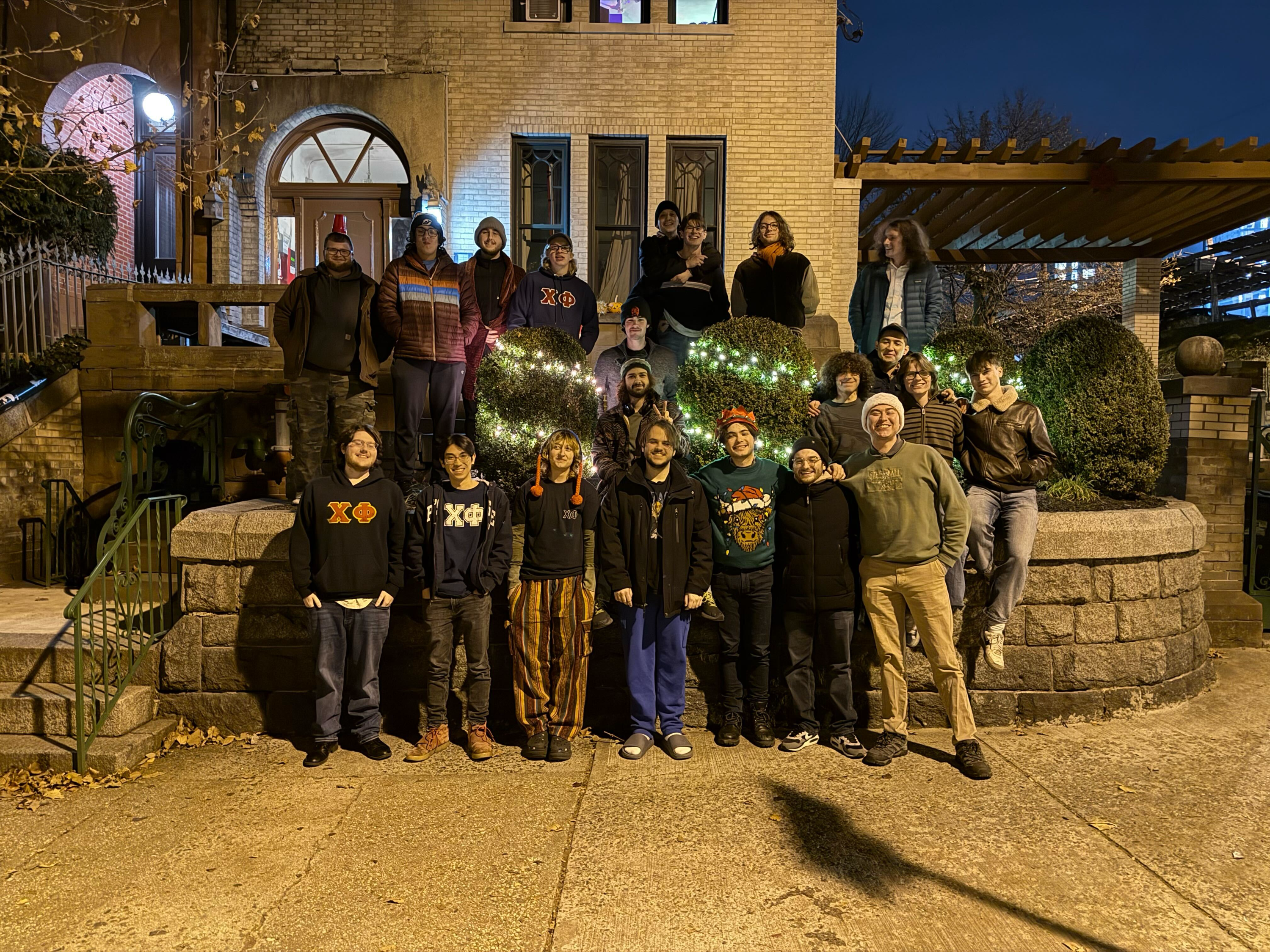 A photo of me with my fraternity brothers at our annual Chi Phi Christmas event